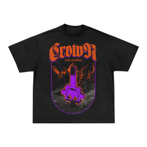 Black heavy cotton unisex t-shirt by Crown The Empire, featuring the band's name in bold orange, a purple and orange sword with a skull hilt, lightning, and a dark stormy background. Classic fit inspired by American Apparel.