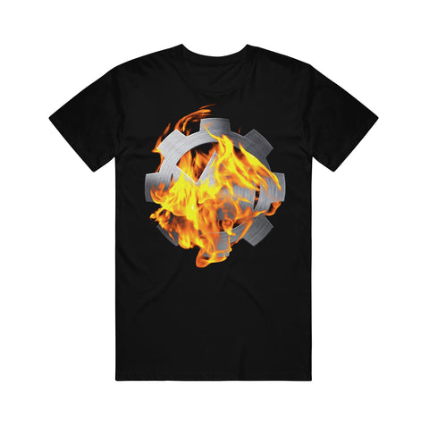 image of the front of a black tee shirt on a white background. tee has a full chest print of a cog on fire.