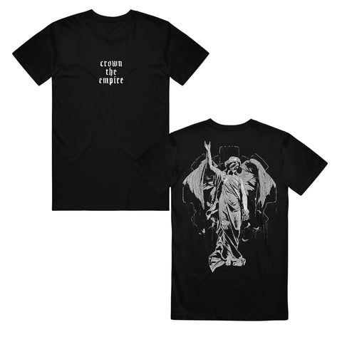 image of the front and back of a black tee shirt on a white background. front of the tee is on the left has a small center chest print in white that says crown the empire in stacked text. the back of the tee is on the right and has a full back print of an angel with one arm raised.