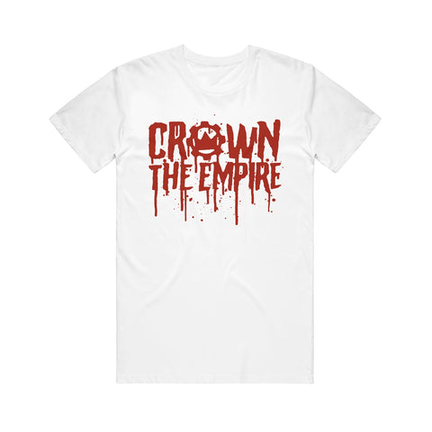 image of the front of a white tee shirt on a white background. the tee  has a full print in red across the chest that says crown the empire in blood dripping text.